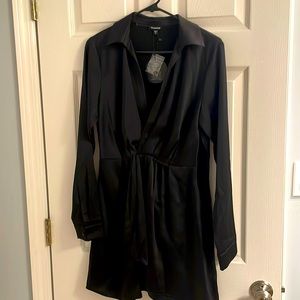 Black long sleeve mini dress. Side zipper. V- neck